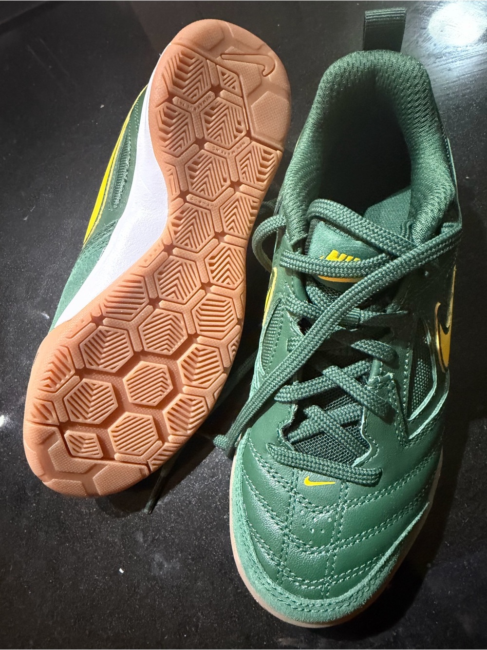 Nike Kids' Green Indoor Soccer Sneakers with Yellow Accents and Gum Sole